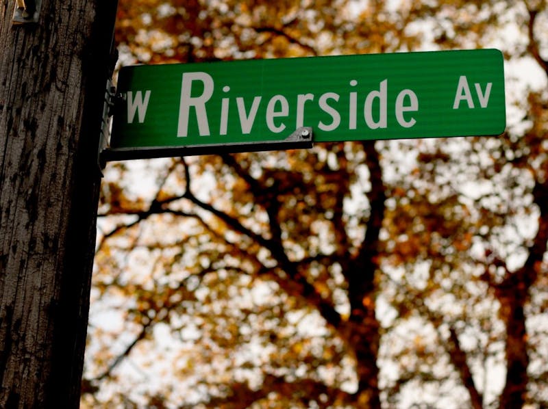 The sun shines on a Riverside street sign off of Ball States campus on Oct. 25 in Muncie, Ind. Thirteen IFC fraternity organizations, some housed on Riverside Avenue are under probation from hosting or co-hosting social events with or without alcohol until Jan. 31 after reports of behavior that does not follow university guidelines. Grace Hollars, DN