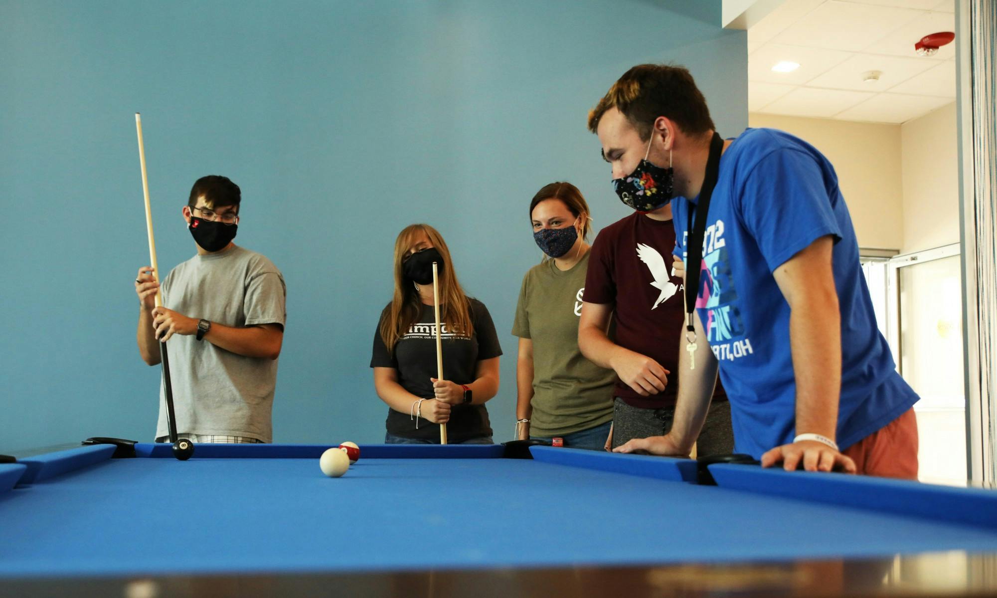 Ball State students play pool, Aug. 20, 2021 inside the new North West Hall. The newly-opened residence hall is home to music, humanities and education living-learning communities. Rylan Capper, DN 