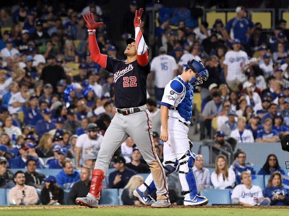 The Washington Nationals' Juan Soto celebrates as he crosses home plate after hitting a solo home run to tie the game against the Los Angeles Dodgers in the eighth inning during Game 5 of the National League Division Series at Dodger Stadium in Los Angeles on Wednesday, Oct. 9, 2019. (Wally Skalij/Los Angeles Times/TNS)