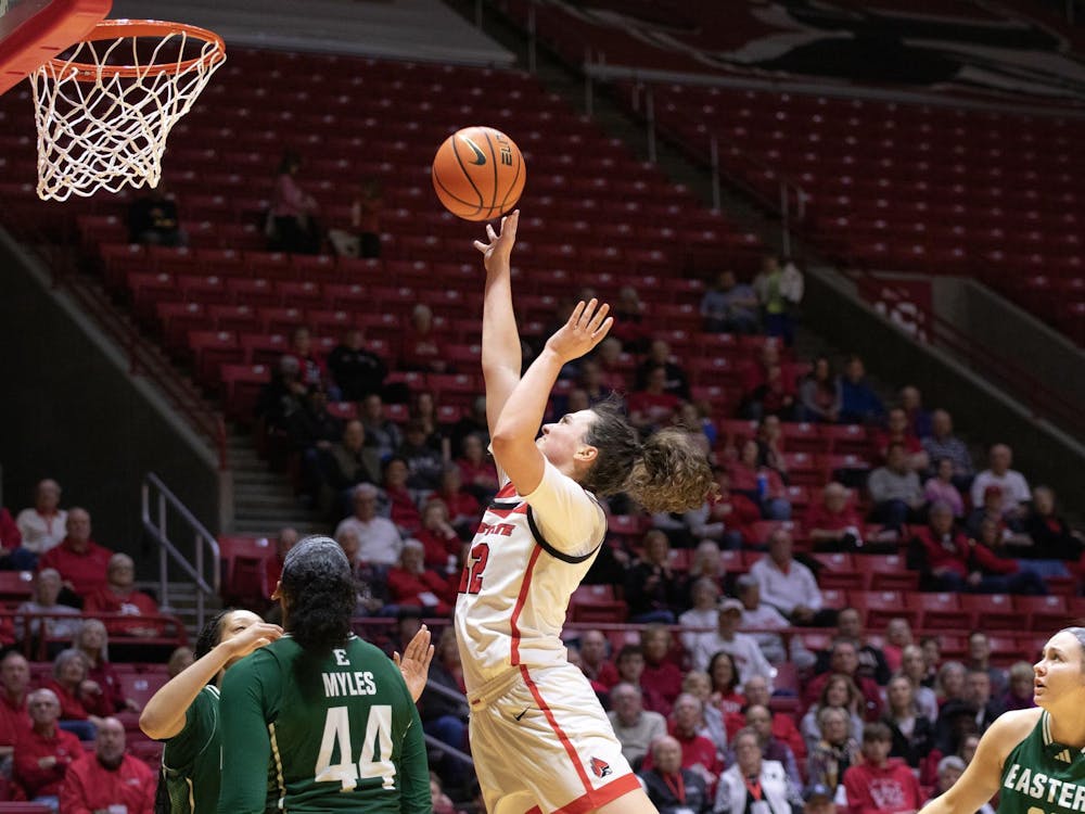 Senior Annie Rauch leaps to score a point against Eastern Michigan March 1 at Worthen Arena. Rauch played 21 minutes of the game. Kate Tilbury, DN