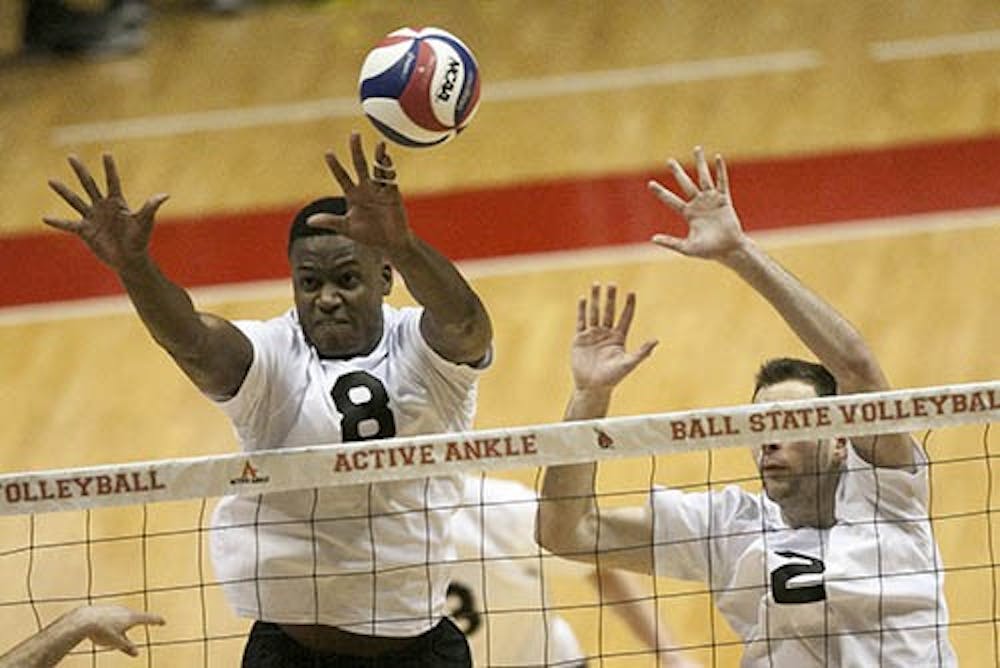 Seniors Jamion Hartley and Matt Leske block a ball during the game against Lindenwood on Feb. 2, 2013 in Worthen Arena. Ball State dropped the semi-finals game of the MIVA against Loyola on April 24. DN FILE PHOTO JORDAN HUFFER