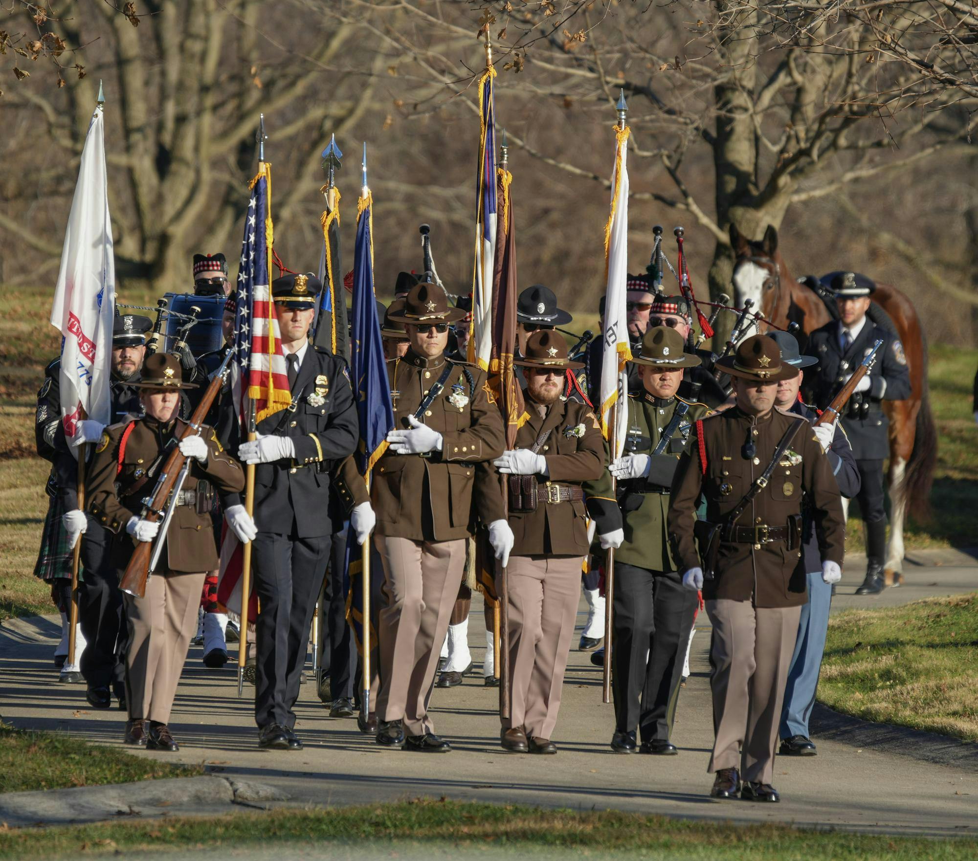 Officers preparing for the presentation of colors for Cpl. Blake Reynolds Nov. 22 at Jones Cemetery. Kyle Ingermann, DN