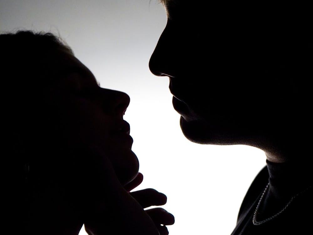 Two Ball State students pose for a photo Sept. 17 in the Arts and Journalism Building. Hookup culture can potentially have positive and negative emotional and physical impacts. Isabella Kemper, DN