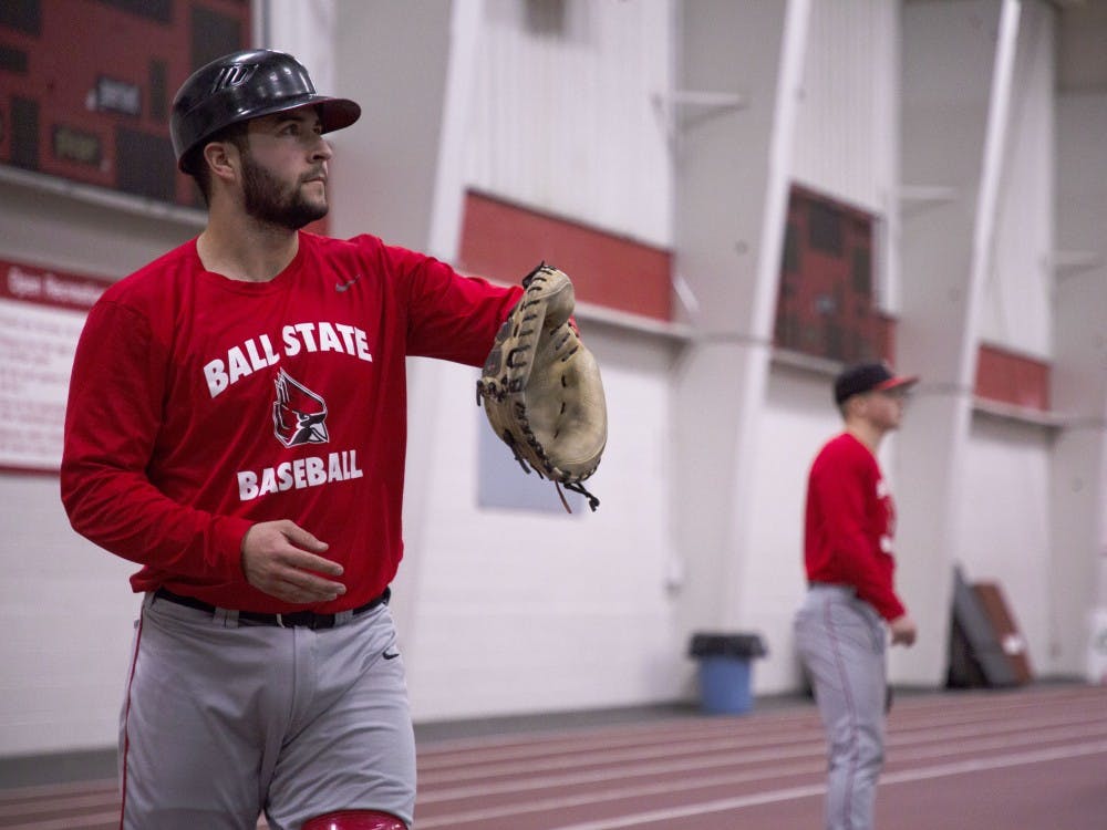 Redshirt junior catcher Chase Sebby warms up before practice Jan. 30, 2019, in the Field Sports Building. Sebby played in 40 games at Cypress College before coming to Ball State. Zach Piatt, DN