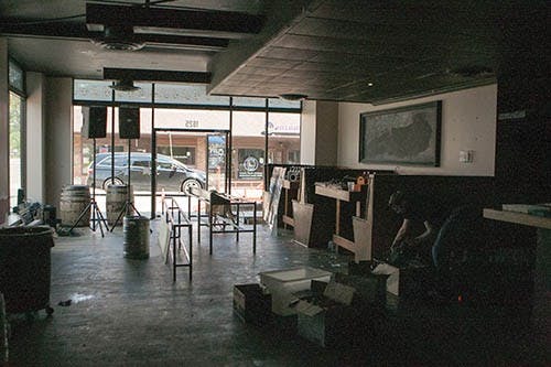 Workers help with the move of Cleo's Bourbon Bar and Red Bird in the Village to their new locations while renovations are being made to their existing locations. The move will only last a year, when both move back into their original locations. DN PHOTO JORDAN HUFFER