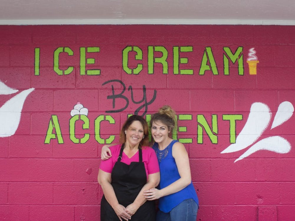 Terry Budaj and Amber White standing out front of their ice cream shop on Tuesday, Sept. 11, 2018, at the location of 1231 South Walnut Street Munice, IN. Terry and Amber just started this business and are looking forward to a successful future. Alex Straw,DN