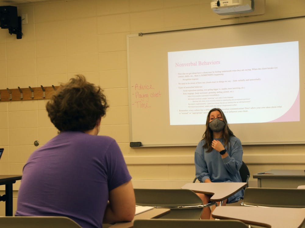 Claire Dugan, counseling psychology doctoral student, teaches the Techniques of Psychological Interactions course Sept. 15. During her class, Dugan teaches a variety of techniques, including roleplaying counseling sessions, lecturing and showing videos. Maya Wilkins, DN