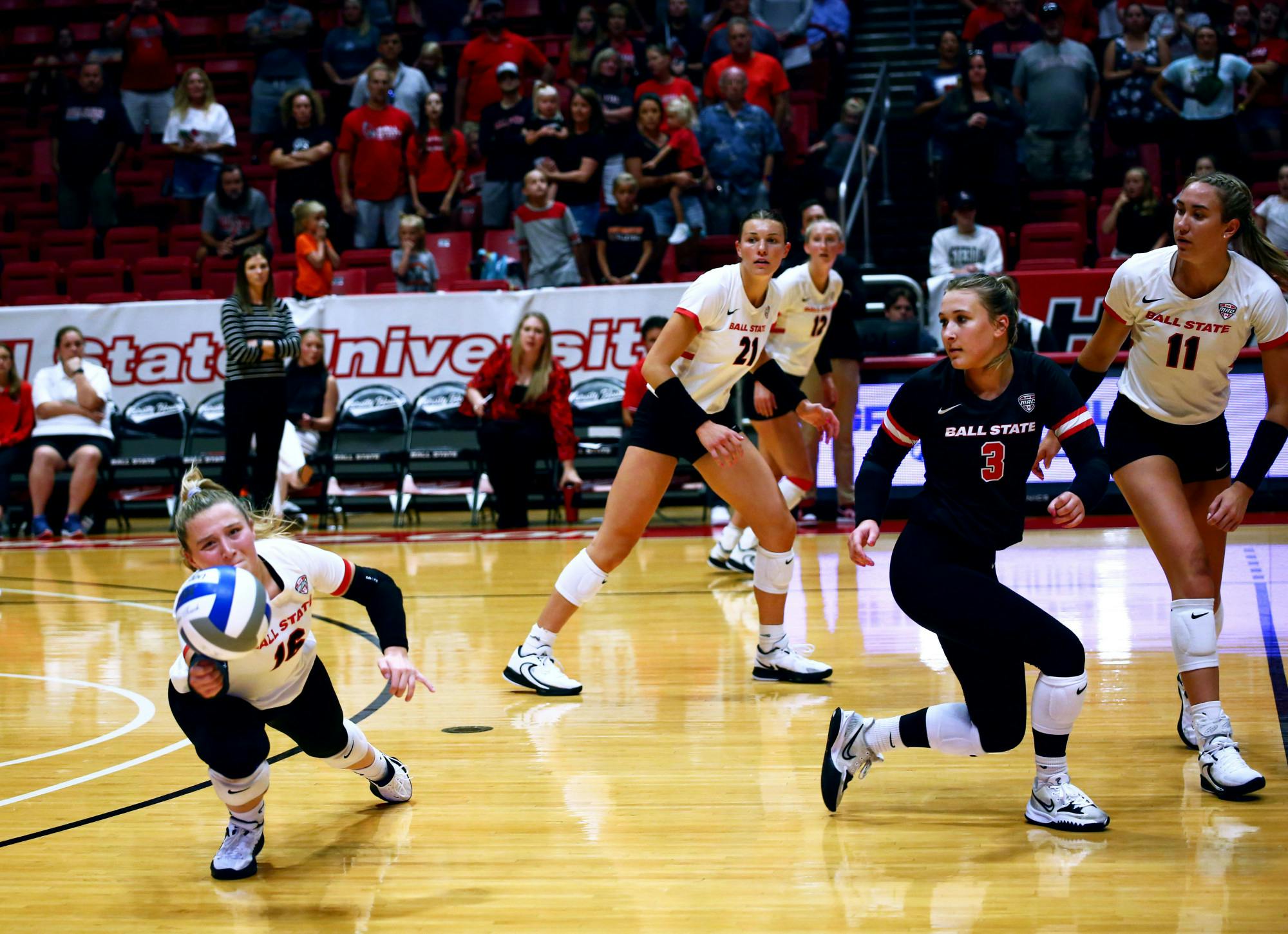 Junior defensive specialist Kendall Seimet saves the ball against The University of Oklahoma Aug. 26 at Worthen Arena. Mya Cataline, DN