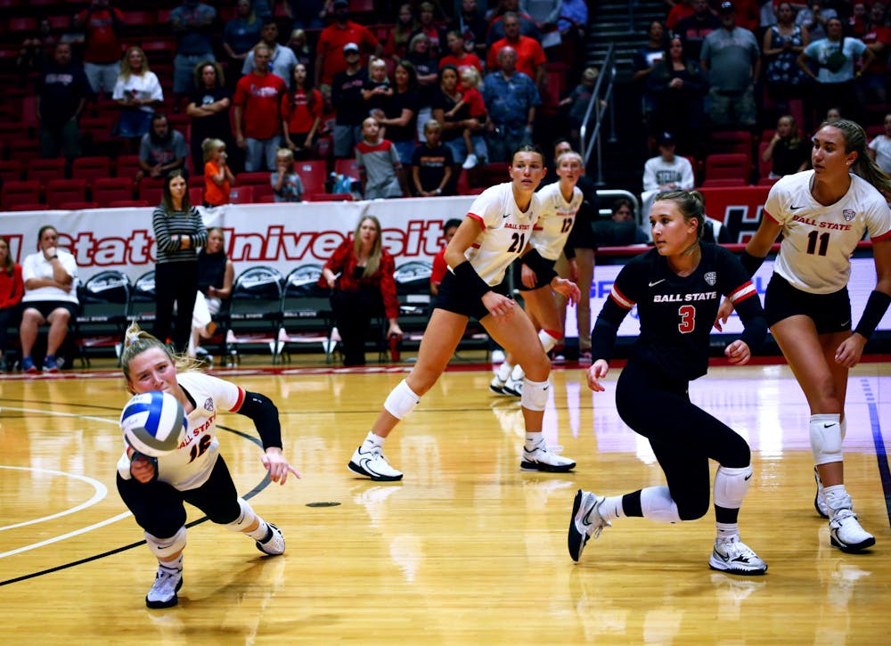<p>Junior defensive specialist Kendall Seimet saves the ball against The University of Oklahoma Aug. 26 at Worthen Arena. Mya Cataline, DN</p>