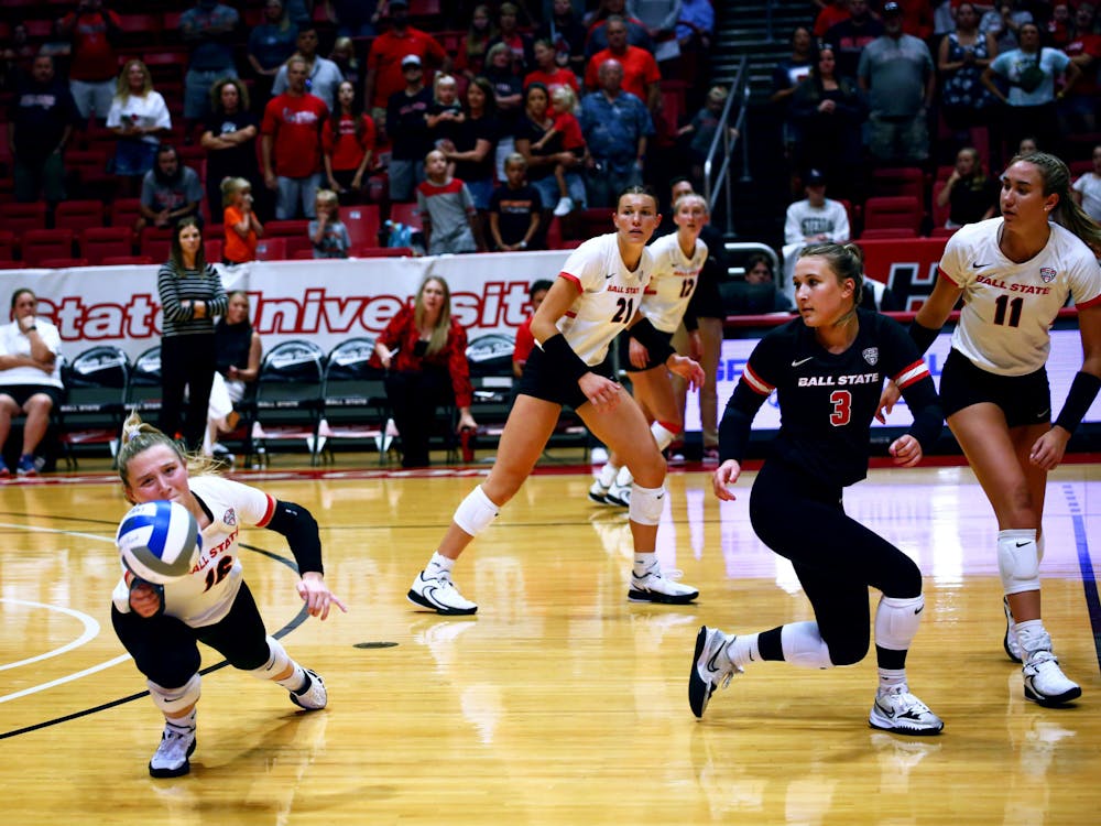 Junior defensive specialist Kendall Seimet saves the ball against The University of Oklahoma Aug. 26 at Worthen Arena. Mya Cataline, DN