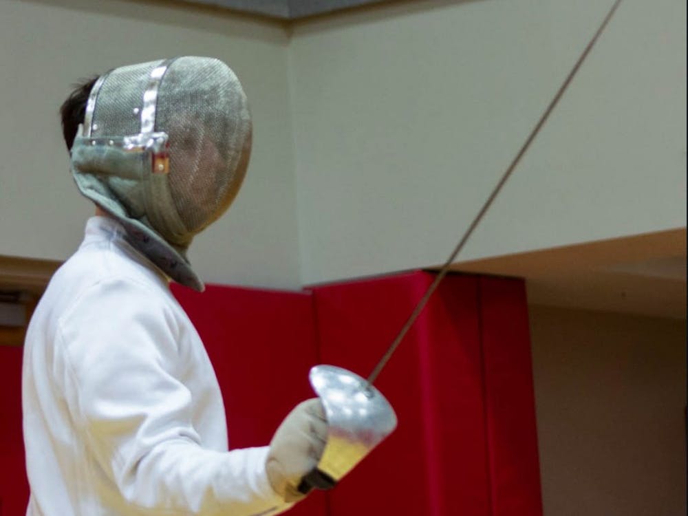 Junior Spencer Deats prepares to take on an opponent during a Ball State fencing club practice at the Ball State Student Recreation and Wellness Center. Patrick Murphy, DN &nbsp;