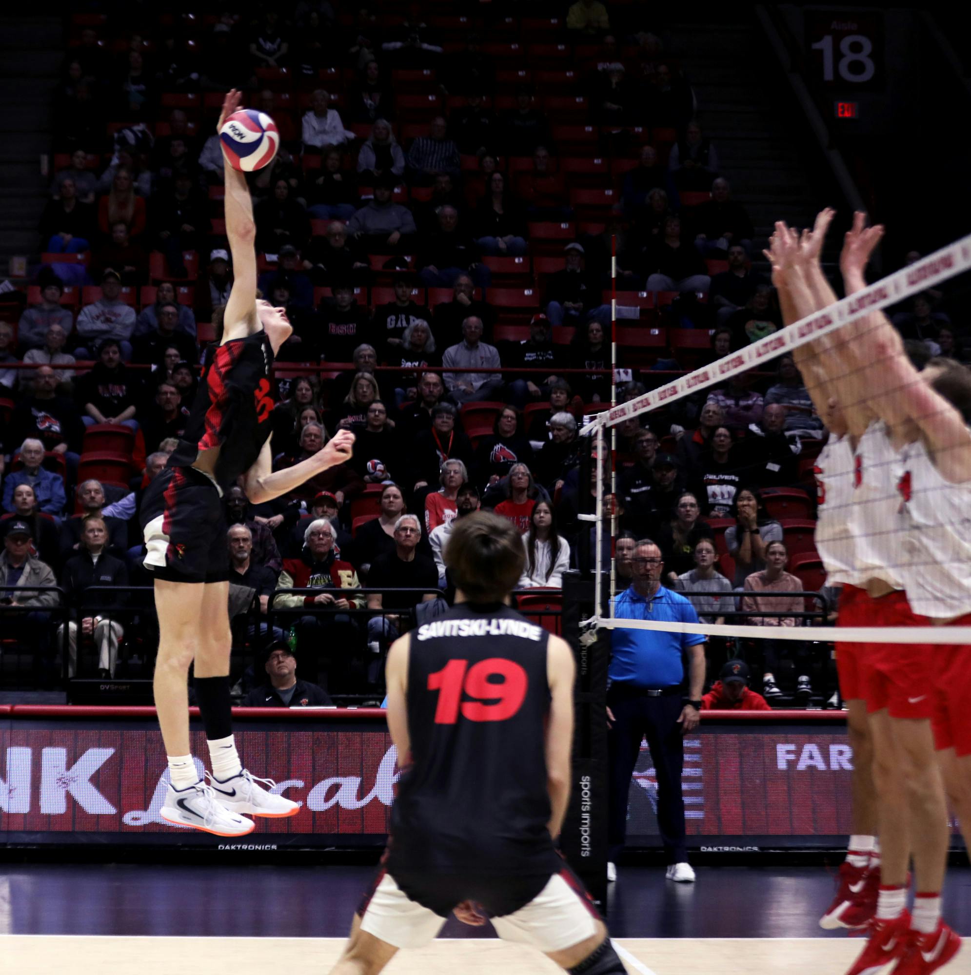 Junior outside hitter Patrick Rogers spikes the ball Feb. 27 at Worthen Arena in a game against Ohio State University. Rogers had 21 points throughout the entire game. Meghan Sawitzke, DN
