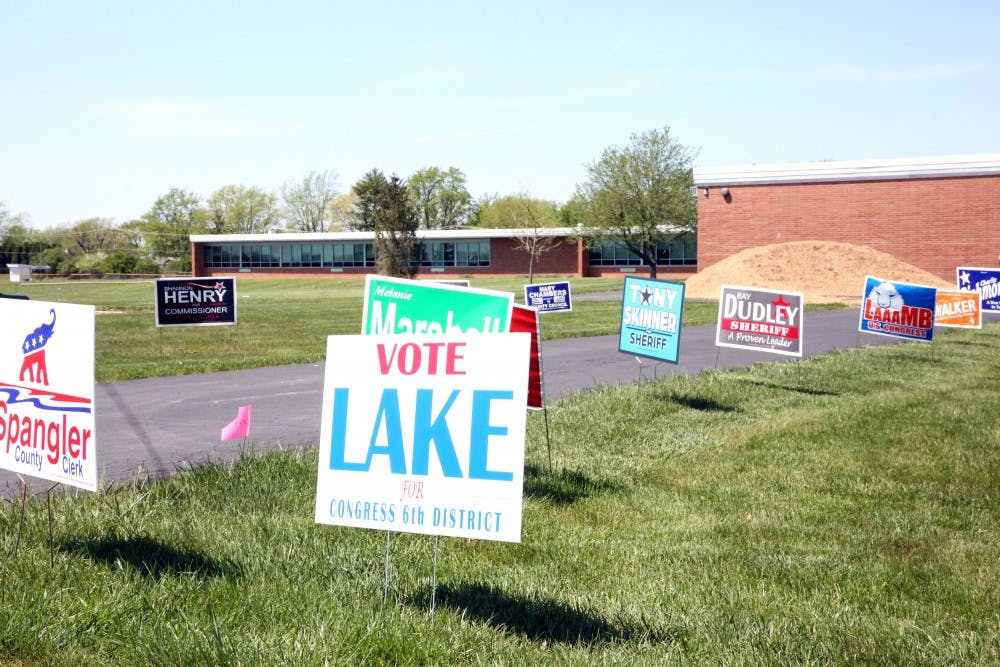 <p>Candidates put signs outside of voting place in Delaware County on Tuesday, May 8, 2018. The primary elections were held to determine who will be on the ballot in the general election. <strong>Andrew Smith, DN Photo</strong></p>