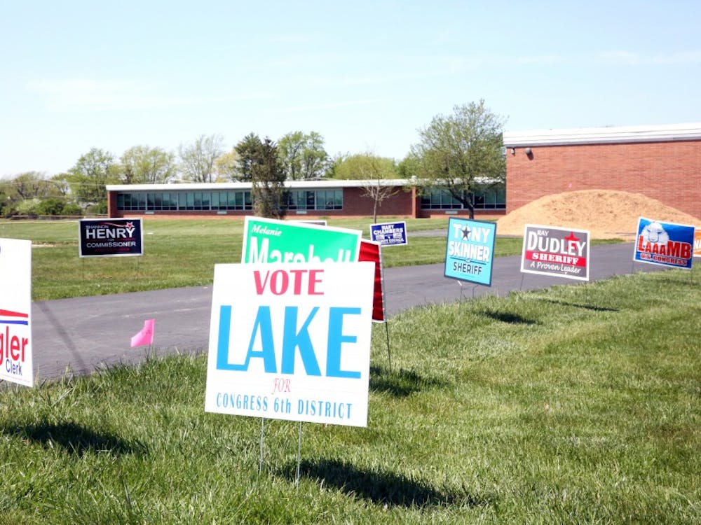 Candidates put signs outside of voting place in Delaware County on Tuesday, May 8, 2018. The primary elections were held to determine who will be on the ballot in the general election. Andrew Smith, DN Photo