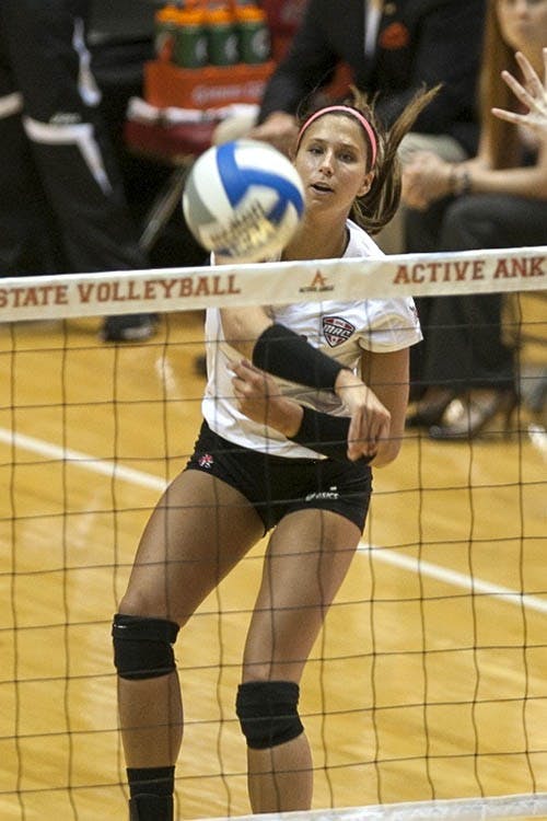 Freshman outside hitter Mackenzie Kitchel plays during the game on Tuesday evening. DN PHOTO JORDAN HUFFER