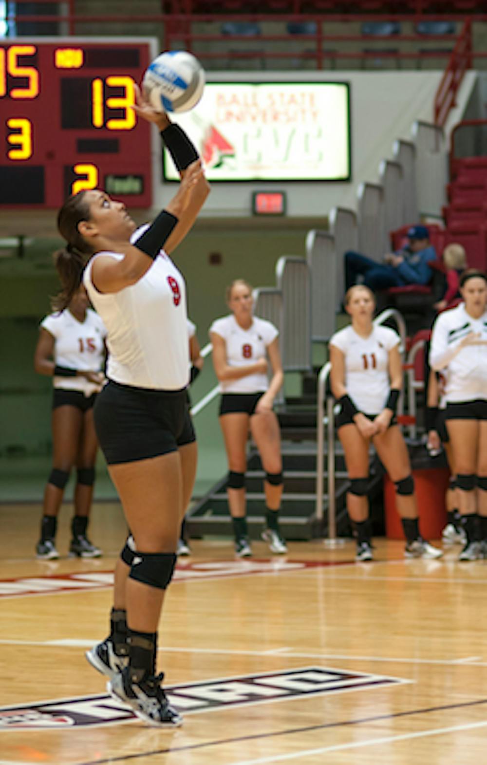DN PHOTO JONATHAN MIKSANEK Jaclyn Fullove serves the ball during Sunday's game against Northern Illinois University. Fullove played in a total of six sets this year compared to her four sets last year.
