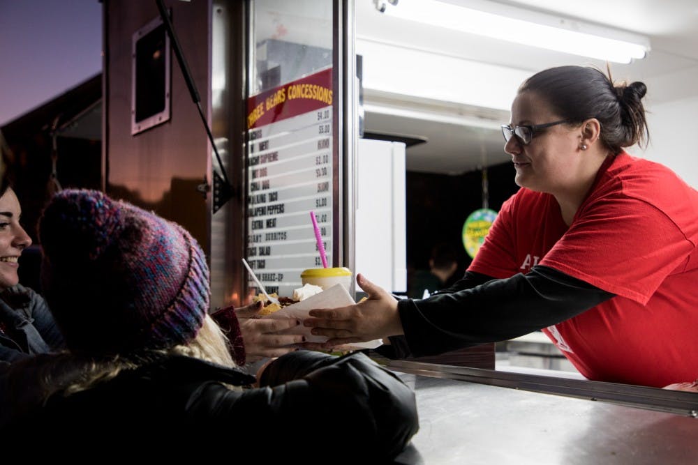 Ball State Students get nachos from Three Bears Concessions Oct. 14, 2019, at Food Truck Fest in the village. Food Truck Village was the first of several events for Ball State's Homecoming week. Eric Pritchett, DN