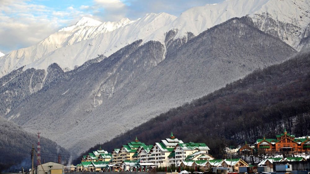 The Sochi Winter Olympics will include many events in the  Laura Biathlon & Ski Complex, which stands upslope from the green-roofed Grand Hotel Polyana. MCT PHOTO