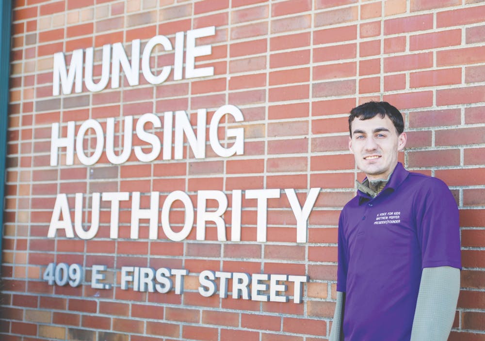 Ball State social work major Matt Peiffer poses for a photo outside the Muncie Housing Authority building March 7, 2021. Peiffer has been lobbying the Muncie Housing Authority since August 2019 to accept Foster Youth to Independence vouchers. Jaden Whiteman, DN