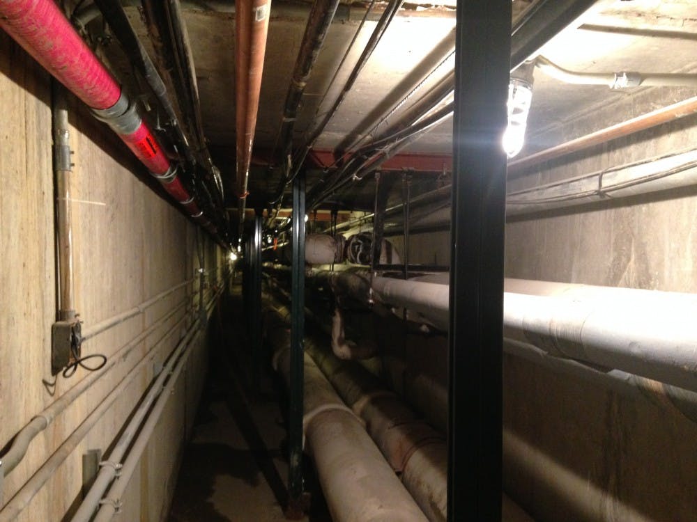 <p><strong>The tunnel underneath the Music Instruction Building</strong> is the newest addition to Ball State's tunnel system. They are used to store utilities and services, and are filled with pipes. <em>DN PHOTO KARA BERG</em></p>