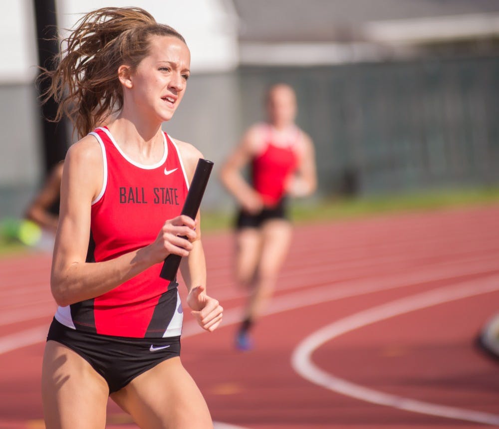 <p>Freshman Amber Jones runs the 4x400 m relay during the Ball State Challenge on April 15 at Briner Sports Comlex. Ball State finished fourth place. Teri Lightning Jr., DN</p>