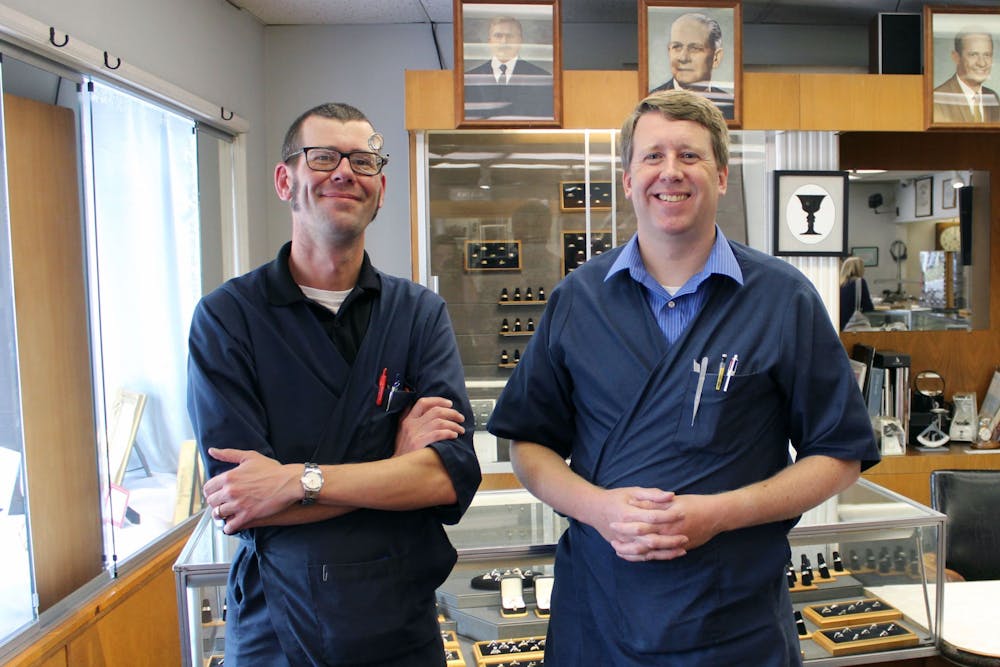 James Murray (left) and Ryan Murray (right) stand in front of a display case at Murray Jewelers. The two are co-owners and the fifth generation in their family to run the business. Maya Wilkins, DN