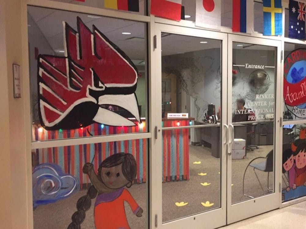 The Rinker Center for International Programs is celebrating this year's Homecoming them 'Cardinals Around the World' with window art. The center has received a lot of attention due to the theme. Samantha Johnson, Contributed