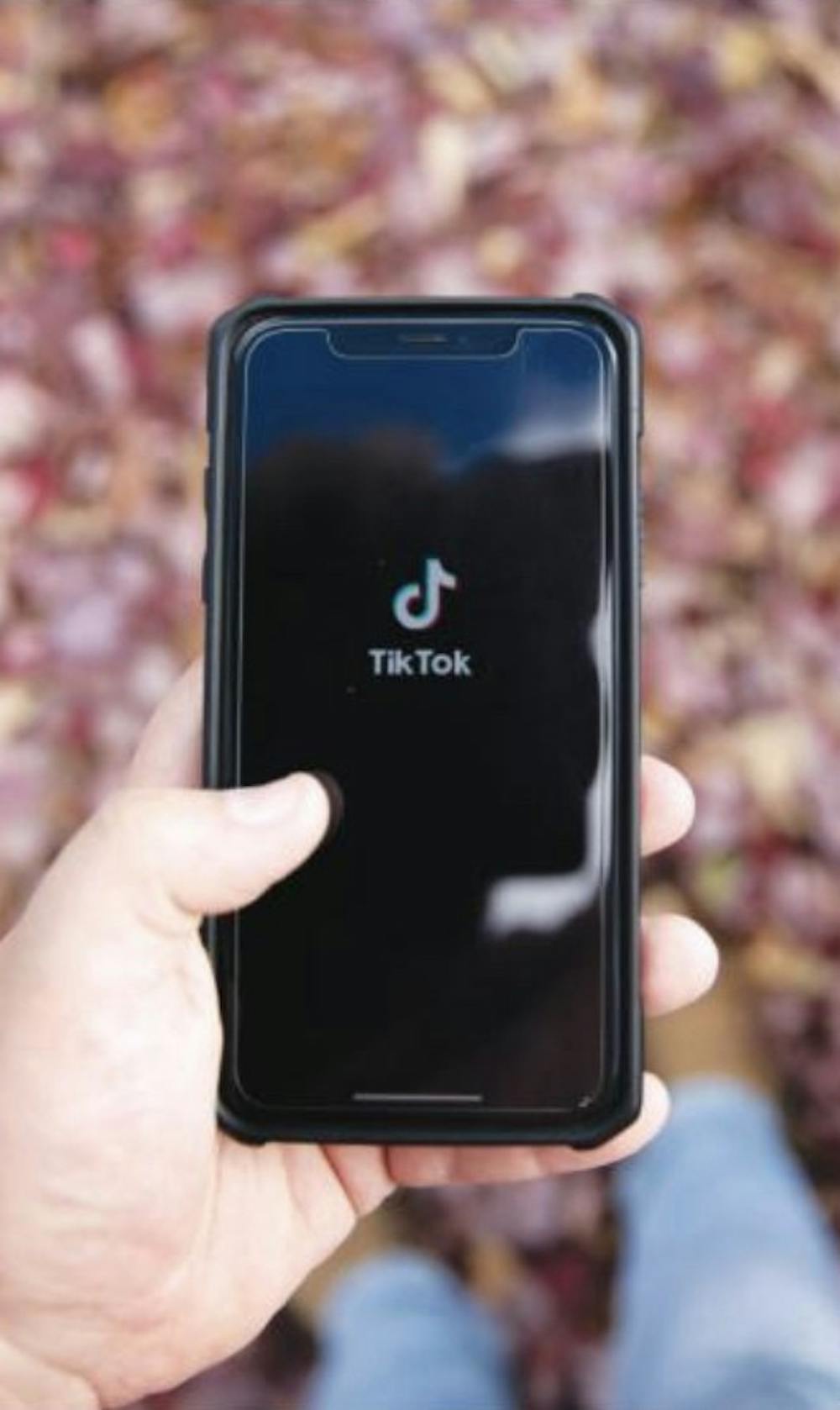 A phone opens TikTok Nov. 10, 2020. TikTok has been downloaded more than 2 billion times in the Apple App Store and Google Play Store. Jacob Musselman, DN Illustration