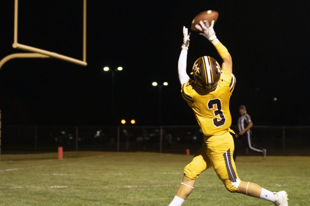 Monroe Central player catches the ball in the touchdown zone to score a touchdown on September 27th, 2019 against Wes-Del High School. Monroe Central won the game 41-12. Jaden Whiteman, DN