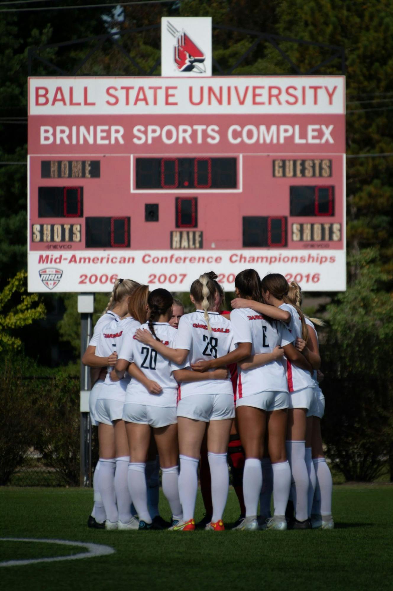 The starting Cardinals rallied together to discuss strategy before a game against Northern Illinois  Sept. 29. Ball State defeated the Huskies 4-1. Meghan Sawitzke, DN.
