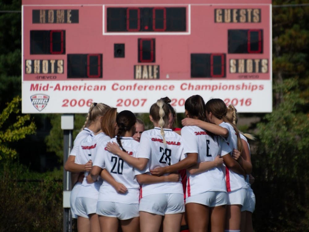 The starting Cardinals rallied together to discuss strategy before a game against Northern Illinois  Sept. 29. Ball State defeated the Huskies 4-1. Meghan Sawitzke, DN.