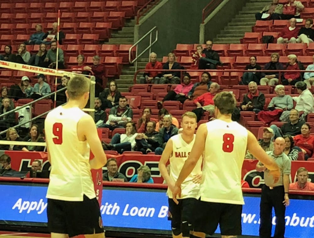 <p>Parker Swartz, Ben Chinnici and Blake Reardon celebrate during the Cardinals' match against UC-Irvine Jan. 7 in Worthen Arena. Ball State lost the match 3-0. <strong>Connor Smith, DN</strong></p>