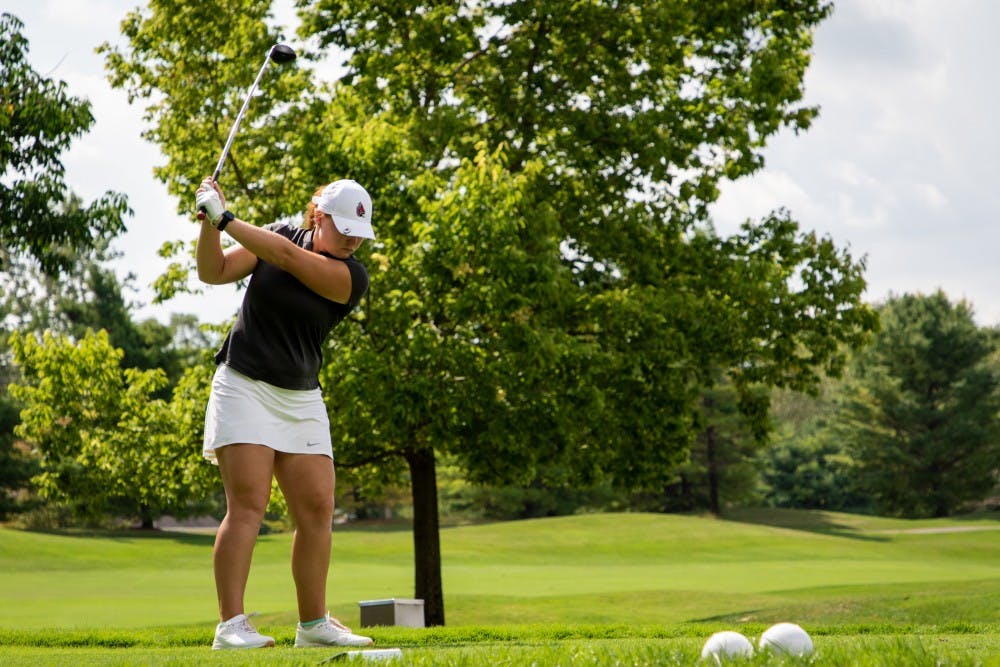 Sophomore Elizabeth Amendola practices her swing on the tee box in the back nine Sept. 16, 2019, at the Players Club at Woodland Trails in Yorktown, Ind. Amendola ended the third round of the Cardinal Classic Tournament 15 over par. Eric Pritchett, DN