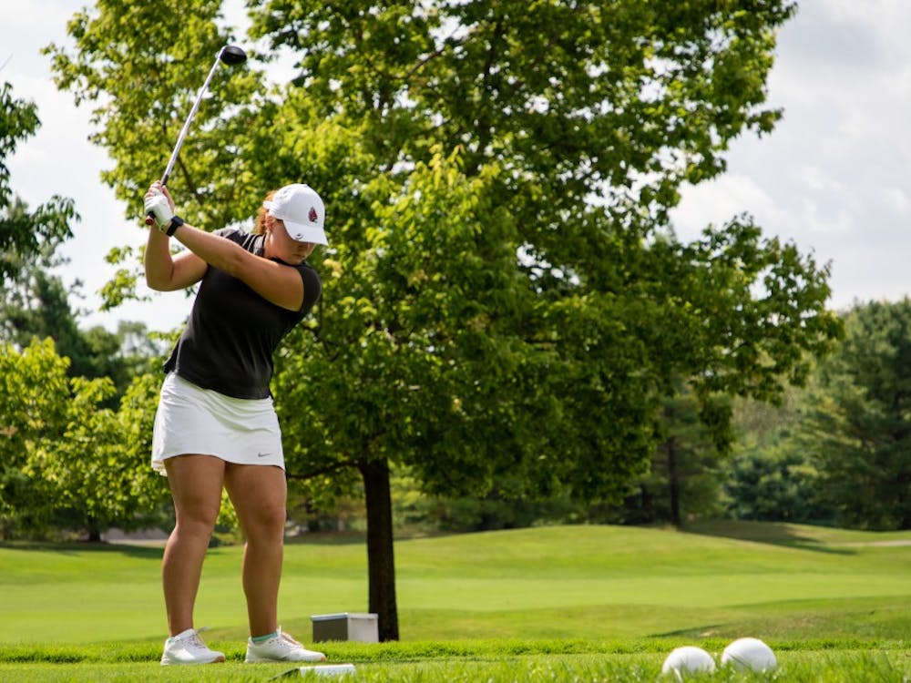 Sophomore Elizabeth Amendola practices her swing on the tee box in the back nine Sept. 16, 2019, at the Players Club at Woodland Trails in Yorktown, Ind. Amendola ended the third round of the Cardinal Classic Tournament 15 over par. Eric Pritchett, DN