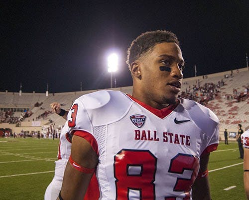 Trey Gardner walks off the field at Indiana after Ball State’s victory over the Hoosiers on Sept. 15, 2012. Gardner is switching from offense to defense during the 2013 season. DN FILE PHOTO BOBBY ELLIS