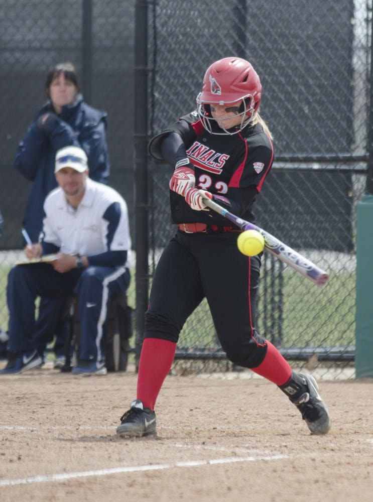 Sophomore Sammi Cowger hits the ball in the game against Toledo on April 6 at the Ball State Softball Complex. Cowger had one hit. DN PHOTO BREANNA DAUGHERTY