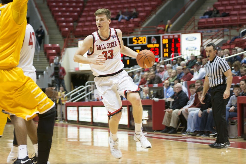 <p>Redshirt junior guard Ryan Weber dribbles the ball up court during&nbsp;Ball State men's basketball 69-66 win against Valparaiso on Nov. 28 at Worthen Arena. DN PHOTO AMER KHUBRANI</p>