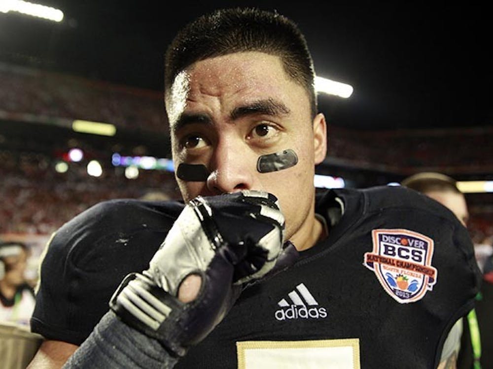 Notre Dame linebacker Manti Te&apos;o (5) fights his emotions as he leaves the field after a 42-14 loss against Alabama in the BCS National Championship game at Sun Life Stadium on Monday, January 7, 2013, in Miami Gardens, Florida. (Nuccio DiNuzzo/Chicago Tribune/MCT)