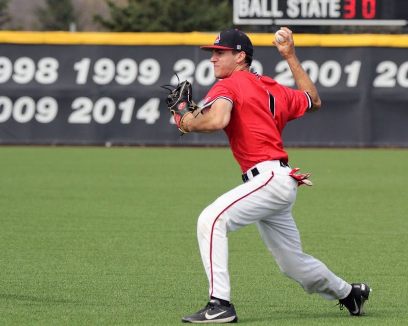 Second baseman Seth Freed throws the ball to first during the Cardinals’ game against Kent State on March 24 at Ball Diamond. Ball State allowed two runs in the third. Paige Grider // DN
