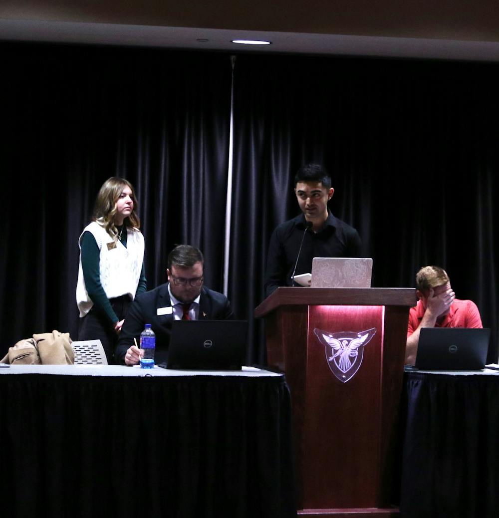 Treasurer Mamed Ramazanli gives his executive report in the L.A. Pittenger Student Center Ballroom March 15. He announced that he is planning an Earth Day Fair event. Madelyn Bracken, DN