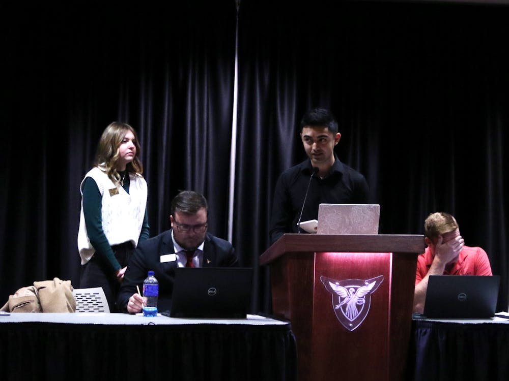 Treasurer Mamed Ramazanli gives his executive report in the L.A. Pittenger Student Center Ballroom March 15. He announced that he is planning an Earth Day Fair event. Madelyn Bracken, DN
