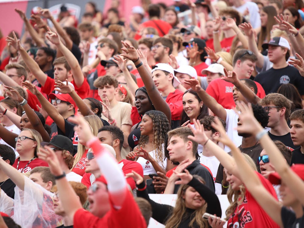 Members of the student section participate in cheers during the Ball State vs. Indiana State game Sept. 16 at Scheumann Stadium. Olivia Ground, DN
