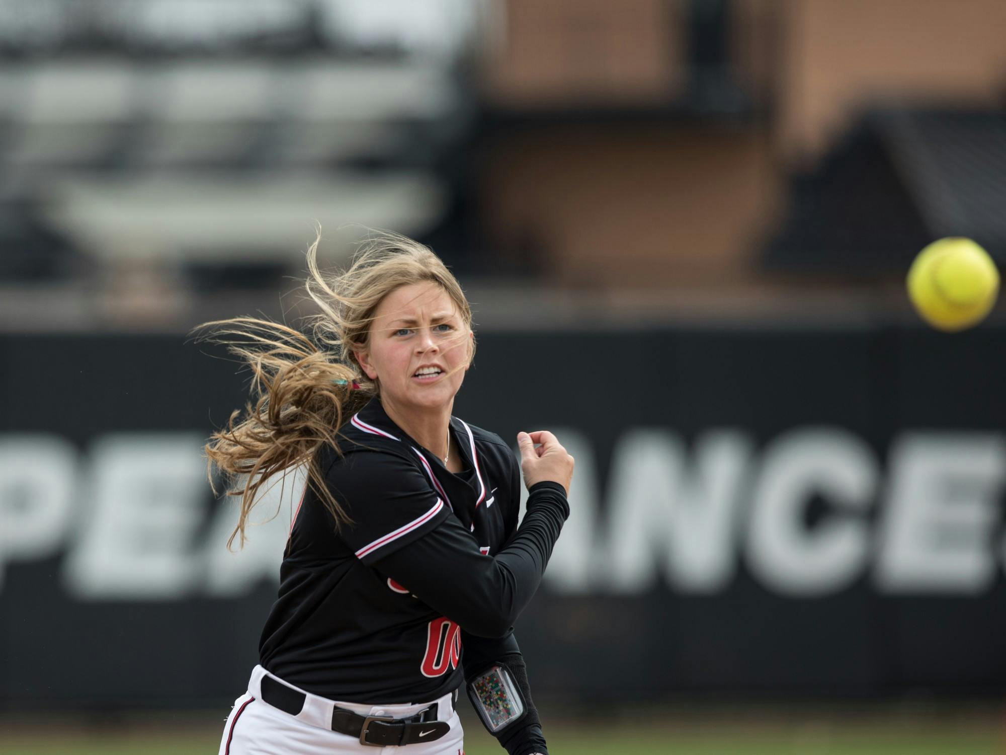 Freshman infielder Kaitlyn Gibson throws the ball during a fielding exercise before Ball State Softball's game against Kent State April 2 at the First Merchants Ballpark Complex. Gibson came into the game as a pinch runner and scored for the Cardinals in the bottom of the third inning. Eli Houser, DN