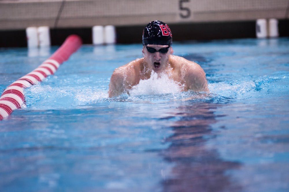 Freshmen Mitch Prather swims the men's 200-yard individual melody event at the 10th annual Doug Coers Invitational at the Lewellen Aquatic Center. DN PHOTO KATIE GRAY