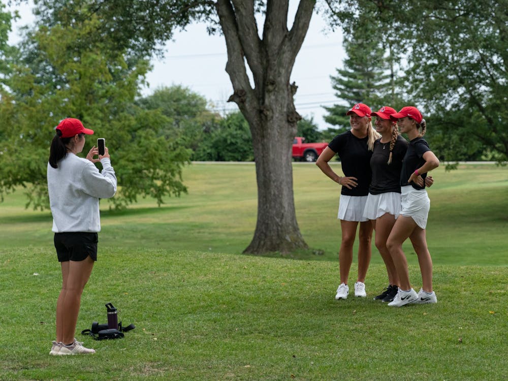 Members of the Ball State Women's golf team pose for a quick photo at hole three during the  Earl Yestingmeier Invite Sep. 3 at the Delaware Country Club. Hosted by the Delaware Country Club, the 2022 Earl Yestingsmeire Invite had 15 teams from schools across the region competing on the par-70 course. Eli Houser, DN