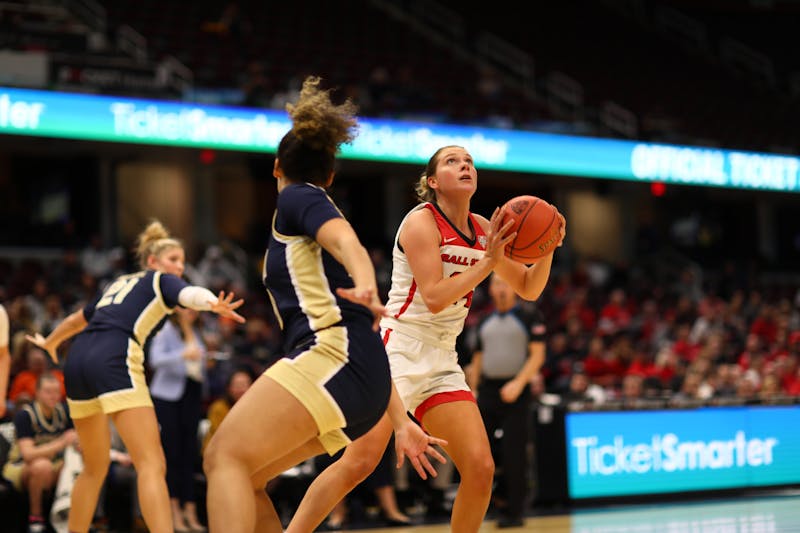 Sophomore Madelyn Bischoff goes up for a shot in Ball State Women's Basketball's first round MAC Tournament matchup against Akron in Cleveland March 8. Bischoff finished with 11 points in the Cardinals' victory. Jacy Bradley, DN