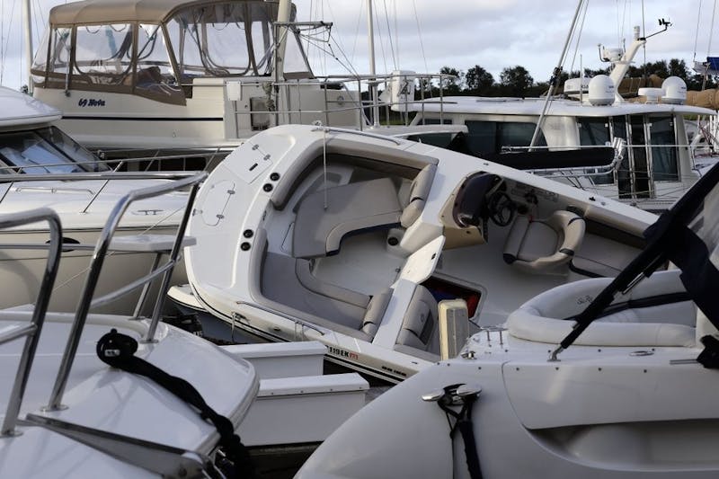 Boats are piled on each other at the Southport Marina following the effects of Hurricane Isaias in Southport, N.C., Tuesday, Aug. 4, 2020. (AP Photo/Gerry Broome)