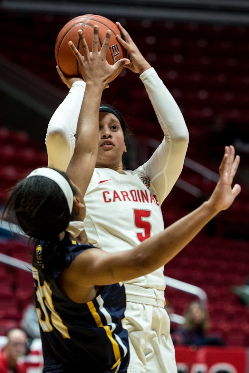 Ball State guard Maliah Howard-Bass sinks a pull up jump shot over Kent State guard Megan Carter in John E. Worthen Arena to keep their lead in the first half of the game Jan. 23, 2019. The women’s basketball game was close up until the last few minutes when Ball State took a lead to win 48-44. Eric Pritchett,DN