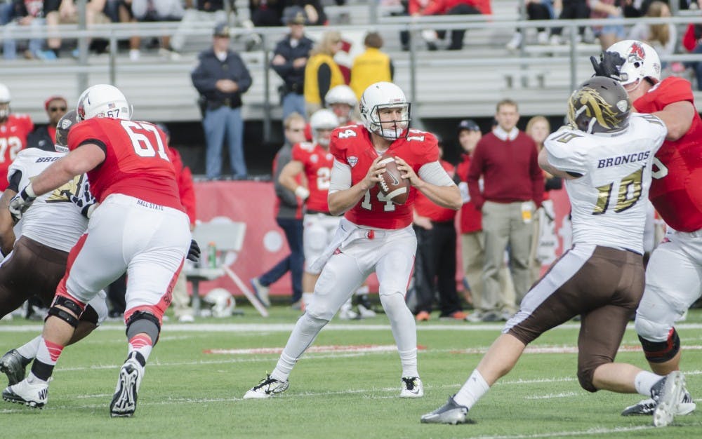 Redshirt freshman quarterback Jack Milas prepares to throw a pass during the game against Western Michigan on Oct. 11 at Scheumann Stadium. DN PHOTO BREANNA DAUGHERTY