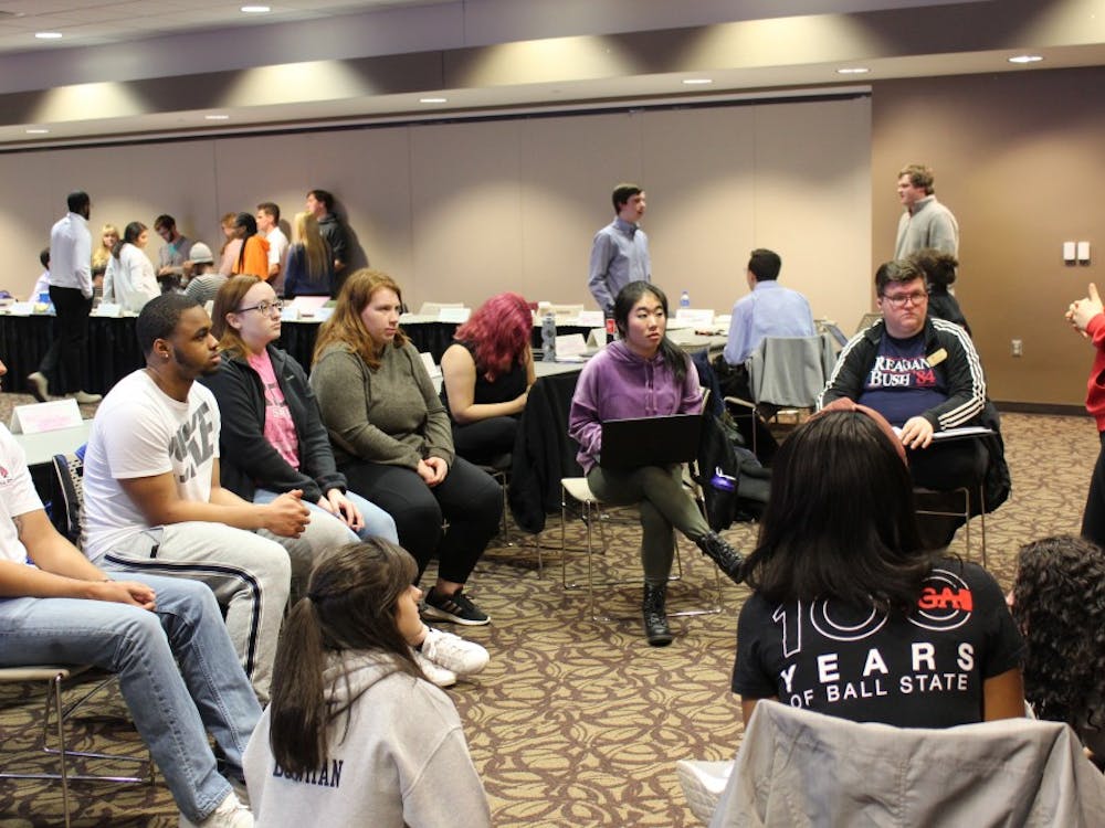 Myriam Bevelle addresses her caucus for a five minute meeting on Wednesday March 13 at the L.A. Pittenger Student Center. President Isaac Mitchell vetoed a resolution co-authored by Myriam, requiring cabinet members to report to the senate. Charles Melton, DN